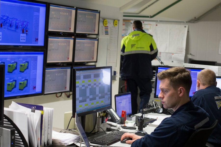 technicians in control room